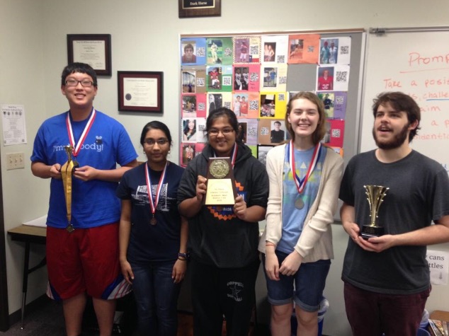 (Left to right) Coppell High School senior Daniel Koh, junior Apurva Gunturu, junior Shayrin Oad, senior Taddie Cook, and senior Will Harrington show off their awards from their UIL competition at Southlake Carroll High School at the District 7-6A Academic Contest last year. 