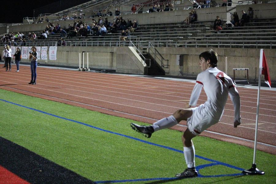 Coppell High School sophomore forward Wyatt Priest goes in for a corner kick in the second half of Tuesday night’s game against the Colleyville Heritage Panthers. The Cowboys won 3-0 at Buddy Echols Field in their second to last regular season game. Varsity, JV and JV2 will all play their last regular season games this Friday before Varsity moves on to playoffs.