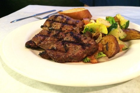 Brave Heart rib eye steak served with mixed vegetables and pan roasted potatoes.