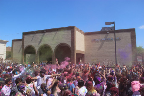 Holi celebrators dance at the DFW Hindu Temple on Sunday. According to ReligionFacts, “Holi also commemorates various events in Hindu mythology, but for most Hindus it provides a temporary opportunity for Hindus to disregard social norms, indulge in merrymaking and generally ‘let loose.’” 