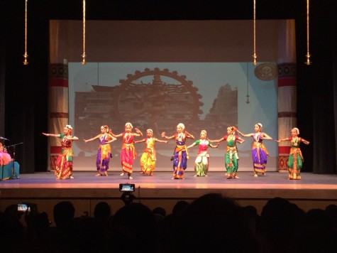 CHS senior Parimala Gangaraj dances in the back row in her green and red dress. Photo taken by Chisom Ukoha.