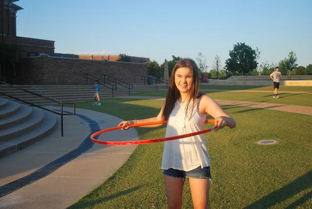 Coppell High School sophomore Ashley Miznazi hula hoops at a charitable event, Night for Nepal, Saturday night at Town Center Plaza. The event raised around $2,500 that will be sent to the project to build a new school in Nepal.
