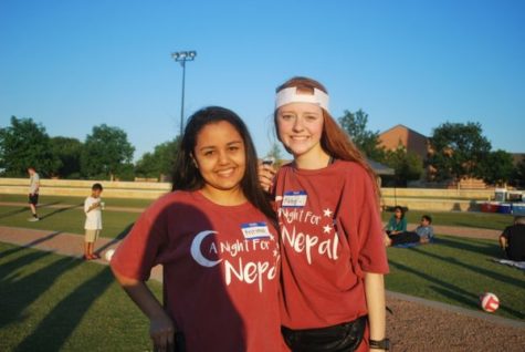 Coppell High School sophomores Kritima Lamichhane and Abby Hymer lead an event called Night for Nepal on Friday at Coppell Town Hall. Night for Nepal is an event in which high school students collected money to build a school in Nepal.