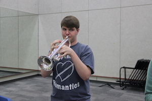 Coppell High School senior Christopher Stubblefield practices his trumpet in the band ensemble room Thursday after school. Stubblefield won first place at the National Trumpet Competition in the High School Division.