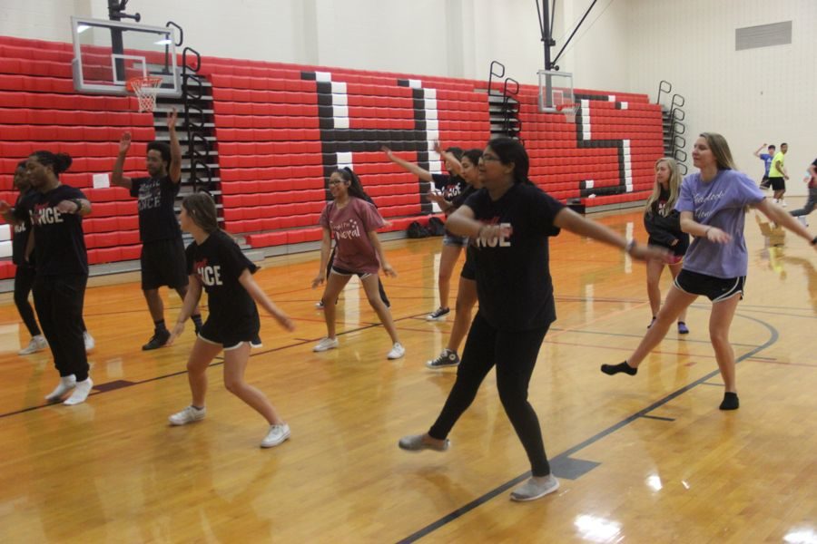 Coppell High School students practice a dance they created during Haley Mitchell’s fifth period dance III class. Students are preparing a dance of their choice for their end of school year final. 
