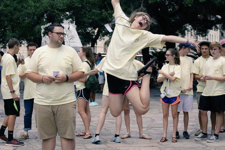 CHS Senior Meredith Munro jumps for joy at the end of a St. Ann High School Ministry retreat.  Photo courtesy Meredith Munro. 