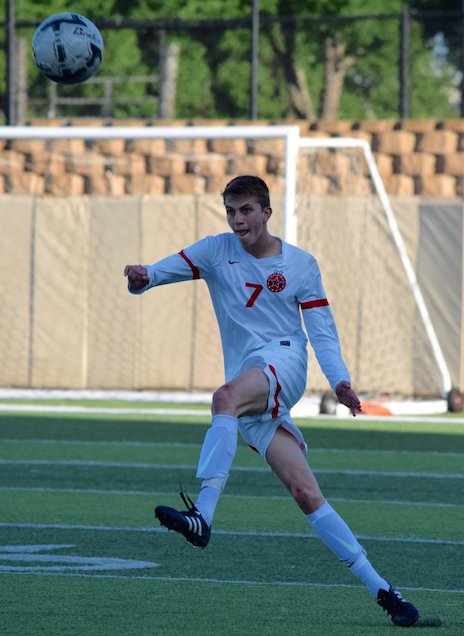 Coppell High School senior Stjepan Killic clears the ball out of the box at Birkelbach Field in Georgetown on Friday night. The Cowboys defeated Cinco Ranch, 1-0 in the Class 6A state semifinals, and will be moving on to the state championship.