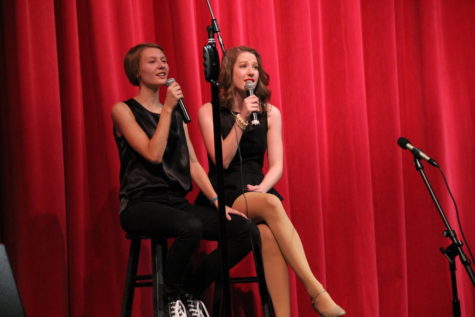 Sisters sophomore Ardi Saunders and senior Lillie Saunders sing Bruno Mars’ “Count on Me,” during the second act of the Friday night Vivacé! Performance. The choir performed their spring concert, which had the theme of Lady Gaga’s popular song and their finale, “Applause,” Friday and Saturday night in the CHS auditorium. 