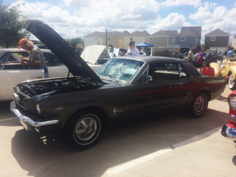 Coppell High School junior Joey Patterson’s restored Mustang is one of many cars on display in the Old Town Coppell square. The annual event features various classic automobiles that have been restored.