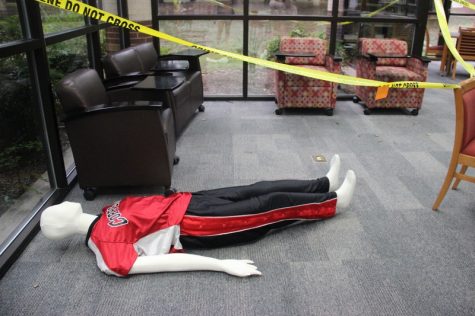 During third period, Coppell High School forensics teacher Sandy Kirkpatrick’s class meets in the library on Monday to conduct a crime scene activity. Students were divided into groups to figure out what happened within the crime scene. 