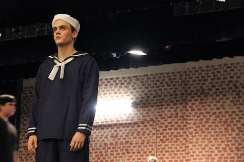 Coppell High School senior Jack Dalrymple practices as the part of Julian Marsh in the dress rehearsal on stage Monday afternoon for the Coppell High School Theater’s current play, 42nd Street. “Theater allows me to deliver important life lessons, and getting to portray that through a character is so much fun,” Jack stated, who has been a participant in theater since the third grade. Photo by Hannah Tucker. 