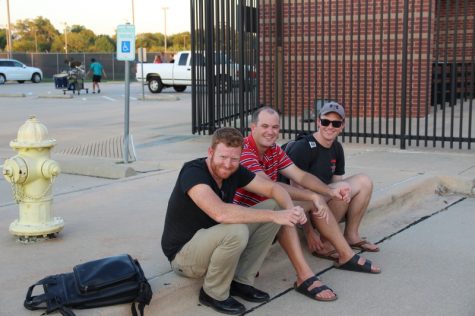 Coppell High School percussion staff (left to right) Zach Scheer, Jonathan Anderson, and Daniel Allen joke around and laugh after practice comes to an end on Wednesday. The Coppell High School band percussion section is highly talented, and attends sectional competitions along with the full band competitions. Photo by Hannah Tucker.