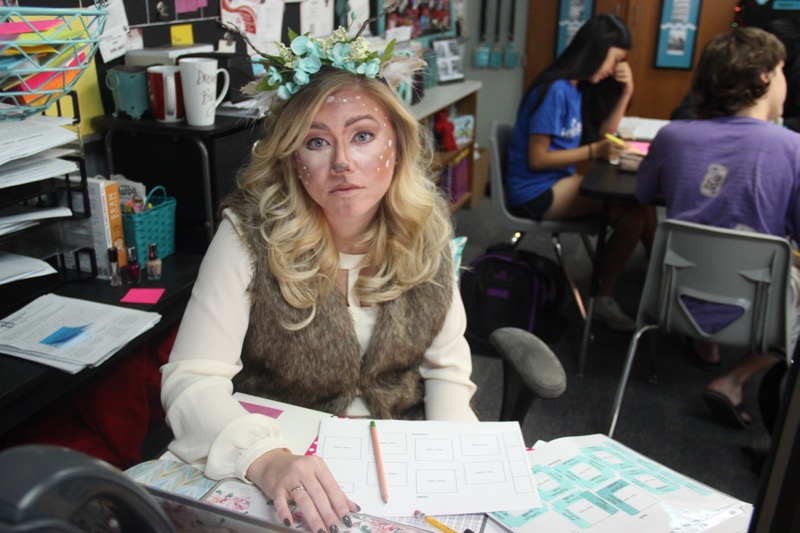 Coppell High School English teacher Sam Neal dresses as a deer, along with face paint and flower crown. English teachers dressed up together during red ribbon week to support safari day on Thursday. 