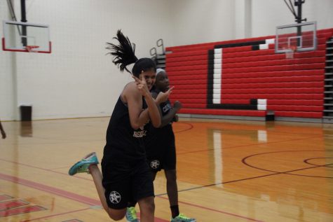 Coppell High School freshman Shrey Kottapatti runs down the court for warm up drill last Friday in the big gym. Kottapatti, who transferred to CHS from private Catholic school, The Highlands, and is now part of the Coppell Basketball team and is enjoying life at a bigger school. 