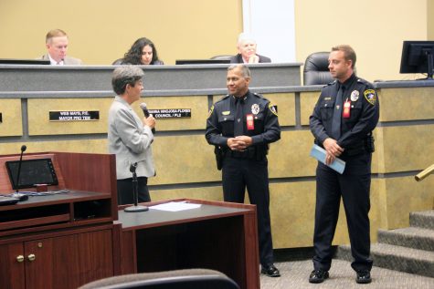 Coppell Mayor Karen Hunt Talks with Police Chief Mac Tristan and Officer Peter Dirks about the dangers of drug abuse and the start of Red Ribbon Week. Photo by Sophia Guerrero.