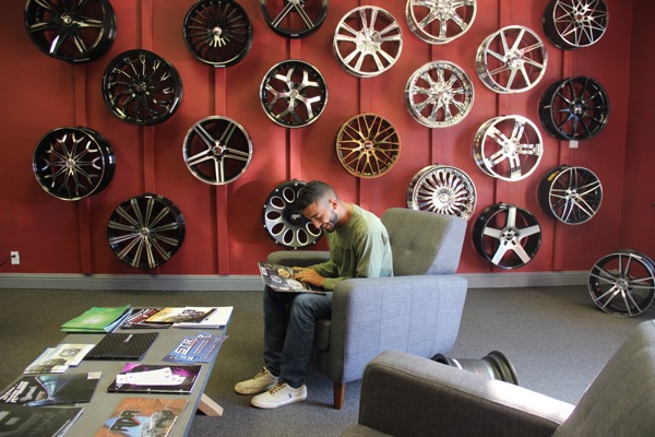 Twenty year-old University of Texas at Arlington student, Ahmad Haj, helps Waseem Atteyah facilitate the store by organizing the prices of the different designs of the wheels and rims. Metroplex Wheels and Tires is located on 1218 N. Belt Line Rd., Irving, TX 75061 and is opened Monday through Saturday at 9 a.m. to 7 p.m. 