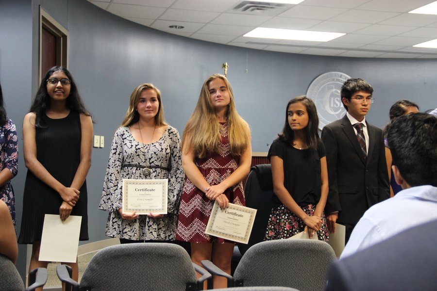 Coppell High School seniors Nikita Belathur, Erin Crumpler, Nicole Crumpler, Amruta Deole, and Nicholas Gonzalez receive the National Merit Semifinalist award during Monday nights board meeting at Coppell ISD building. Students spoke about their post high school plans after receiving their award.