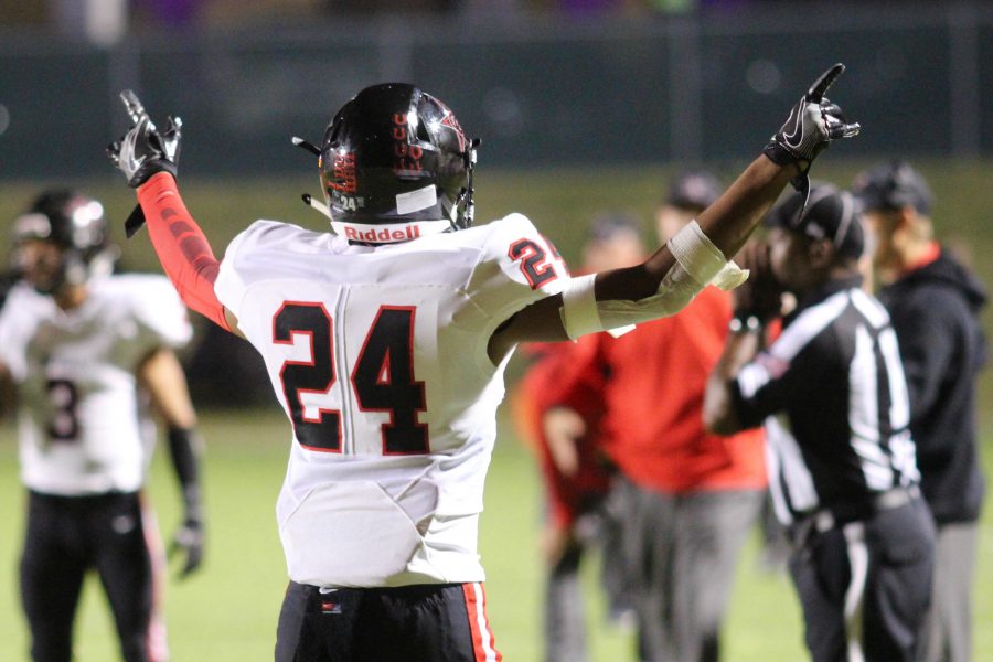 Junior wide receiver Gabe Lemons celebrates a play in the Cowboys 52-10 victory over Lake Highlands on Oct. 7. The Cowboys advance into the playoffs riding a six game winning streak.