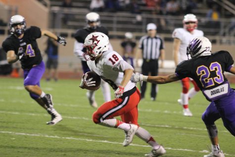 Senior wide receiver Matt Dorrity gets by a Richardson defender in the first half of the Cowboys' sound 52-0 victory over the Eagles on Friday night. Dorrity finished with 31 yards and a touchdown on three carries.