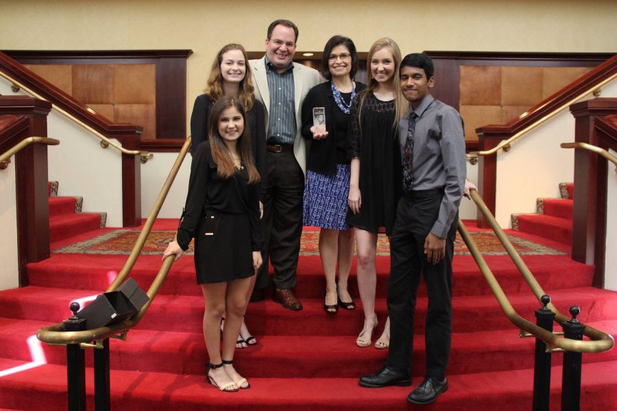 Irma Kennedy holds one of the Lone Star Emmy Award with her students, Ashley Miznazi, Alana Rood, Autumn Jones and Ashwin Suresh. Several KCBY members were given two awards known as the Best Light News and Best High School Newscast.