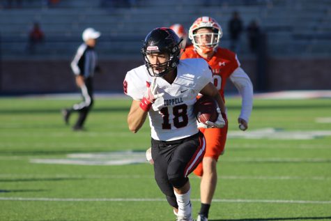 Senior wide receiver Matt Dorrity gets away from the Rockwall defense for a score late in Coppell's 29-25 victory. Dorrity had his best game of the year, catching four passes for 135 yards and two touchdowns.
