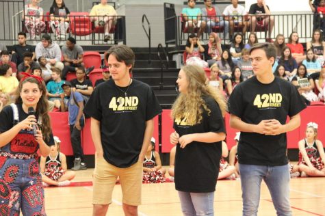 Last Friday in the arena, Coppell High School senior theater members Natalie Wix, Ty Dalrymple, Allison Davis and Jack Dalrymple (left to right) talk about the theater’s upcoming performance of “42nd Street” and invite guests to attend. Their next performance is Nov. 4-6. Photo by Hannah Tucker.