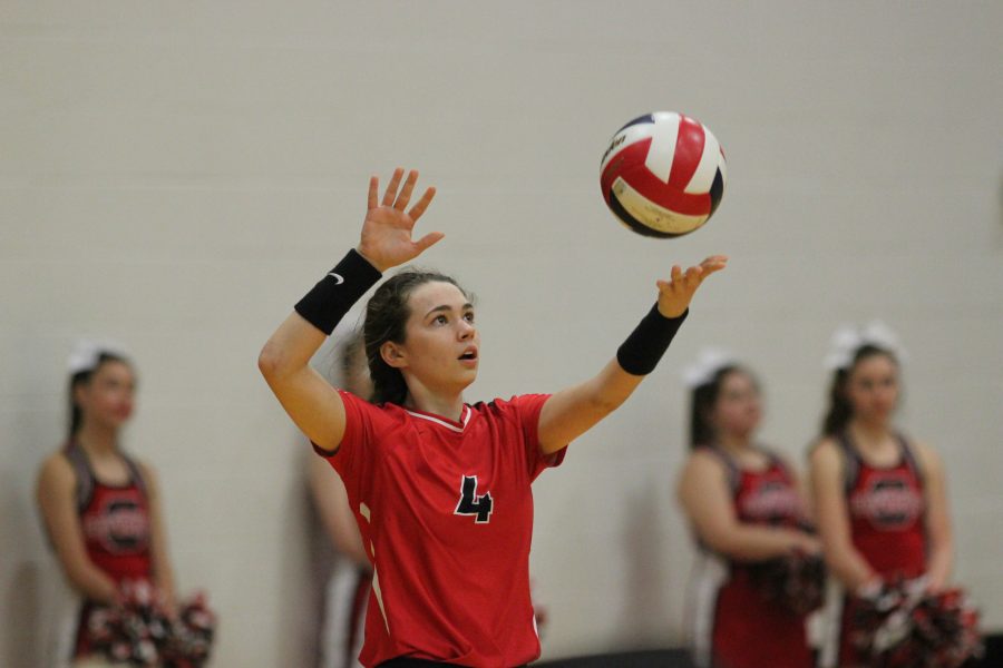 Coppell junior Sam Silver serves the ball during the Cowgirls win in straight sets vs. Garland in the first round of playoffs.