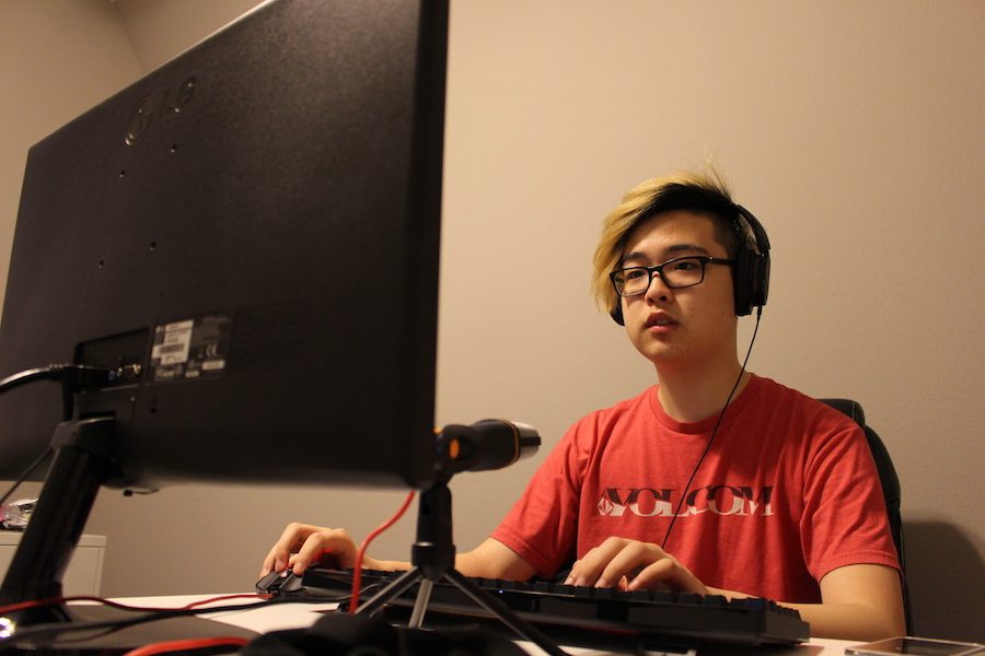 Coppell High School senior Andrew Yi plays League of Legends, an online battle arena game, on the afternoon of Dec. 12. Yi is one of many CHS students who play competitive video games to relax and have fun outside of school.