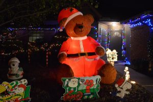 The Suttons decorate their yard with an inflatable bear, illuminating their yard on Parkway Boulevard. The Suttons decorate every year, but this is the first they have the bear.