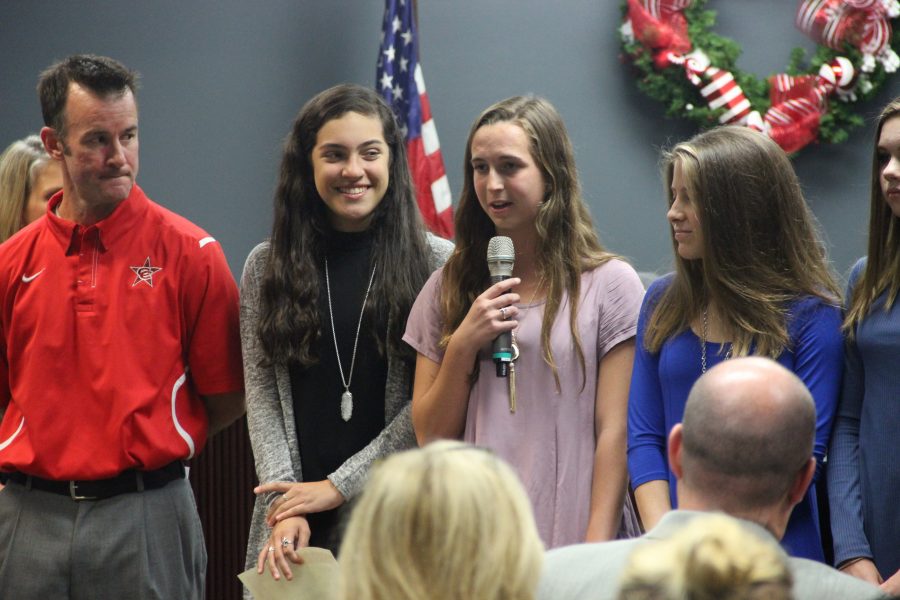 Coppell High School senior Miranda Dickson is recognized alongside the CHS girls cross country team at a Board meeting on Monday. Dickson shared her intent to attend the University of Texas for Business. Photo by Amanda Hair.