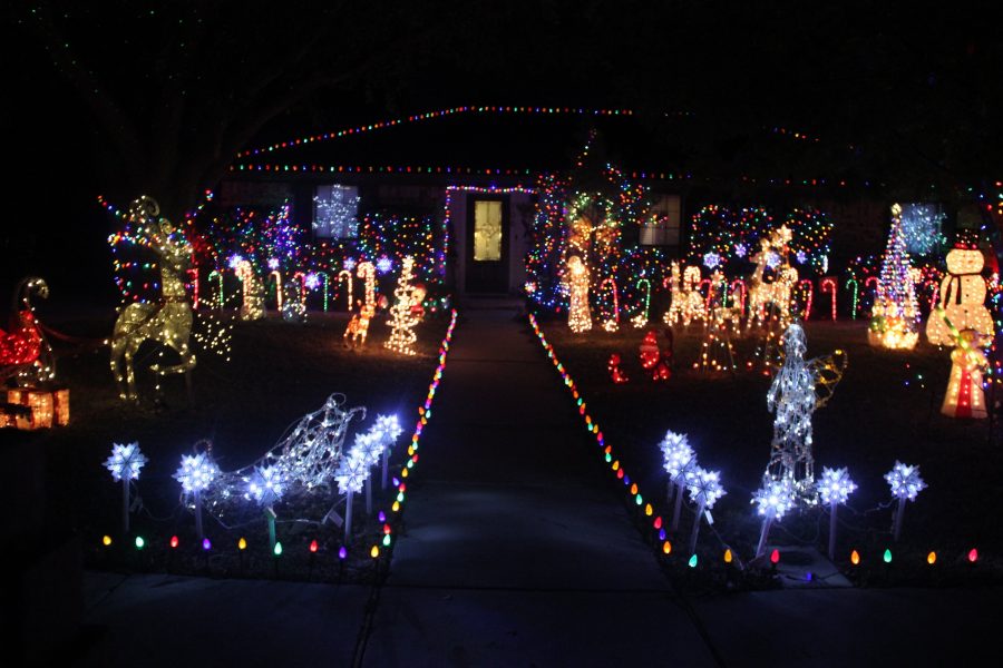 Elaborate holiday displays light up yards, faces of residents