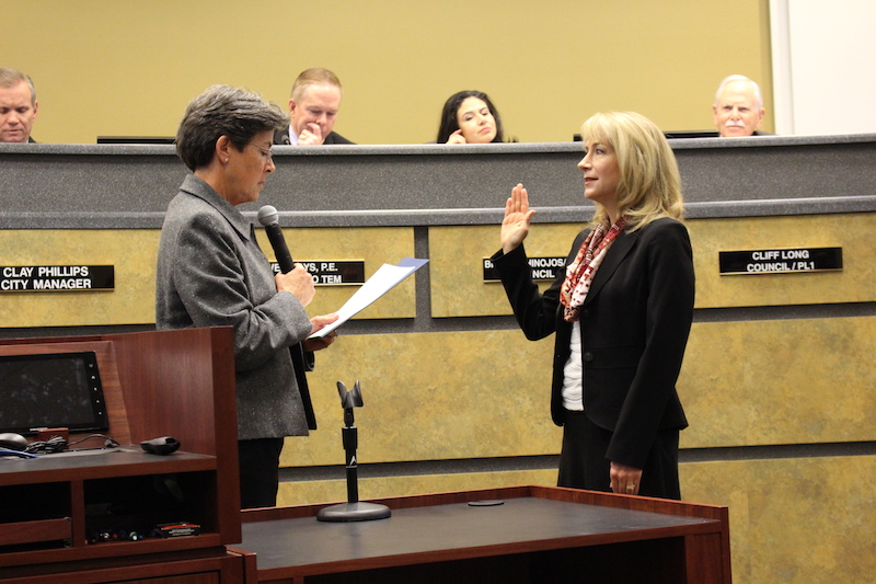 Coppell Mayor Karen Hunt swears in new Alternative Municipal Judge, Candace Carlson, on Feb. 14 at the City Council meeting. Coppell City Council members and citizens gathered to resolve zoning issues and other agenda items.  