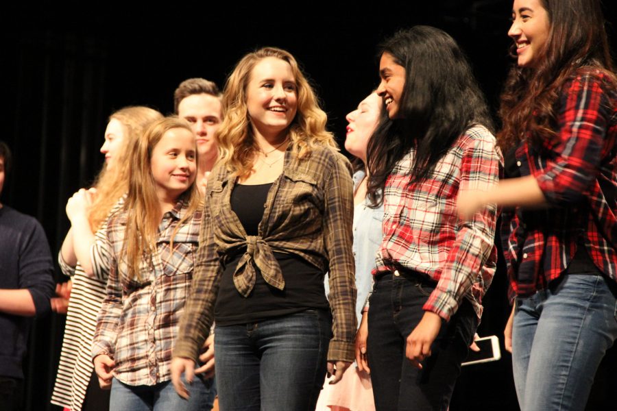 Coppell High School juniors Riya Mahesh, Amelia Vanyo, and Ashley Benhayoun,and Coppell Middle School East seventh grader Sabrina Vanyo accept their first place recognition at the CHS talent show. A wide variety of acts were performed on Friday night in the CHS auditorium. 