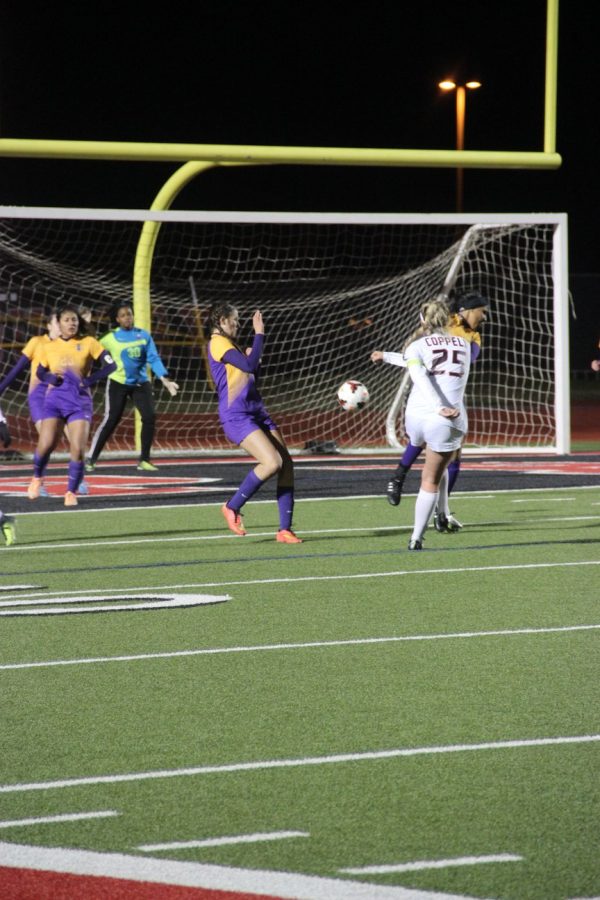 Coppell High School junior midfielder Tyler Runnels shoots the ball into the goal during Tuesdays night game against Richardson. Coppell claimed a 5-0 win over Richardson at Buddy Echols Field.
