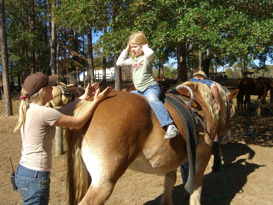 The Sidekick editor-in-chief Meara Isenberg rides a horse for the first time at Indian Princess camp in 2004. Her tribe “The Firewalkers” made her get outside and experience the great outdoors. Photo courtesy Meara Isenberg.
