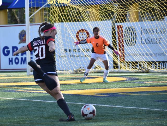 Coppell+High+School+sophomore+forward+Micayla+Weathers+takes+a+shot+during+the+first+half+of+Friday+nights+Class+6A+Region+II+bi-district+match+at+Highland+Park+High+School.+Weathers+scored+two+goals+in+the+Cowgirls%E2%80%99+3-0+victory+over+Garland+Lakeview+Centennial.