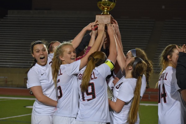 The Coppell High School girls soccer team celebrates its  District 9-6A championship after Tuesday nights win at Buddy Echols Field. Coppell defeated Skyline, 13-0. 