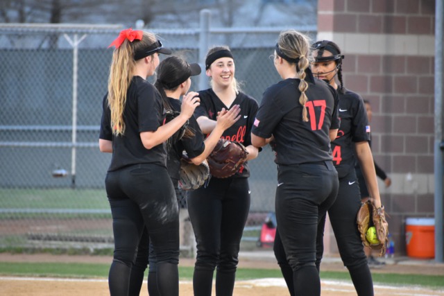 The Coppell High School softball team celebrates a strikeout during Tuesday nights game at  the Coppell ISD Baseball/Softball Complex against Berkner. The Cowgirls won 16-1 to continue their undefeated season. 
