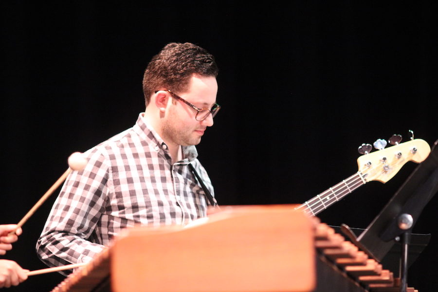 Grammy nominated Drumset Artist Michael D’angelo plays the bass guitar at the Purely Rhythmic concert on Friday night in the CHS Auditorium. He was featured in the CHS percussion’s performance of “Cornbread Funk” by Matt Ehlers. Photo by Hannah Tucker.
