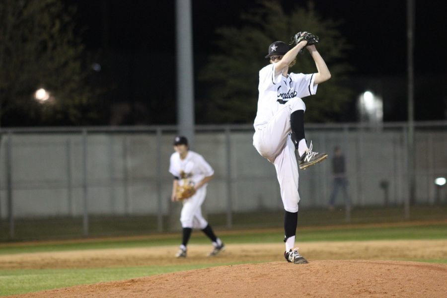 Coppell High School senior John Kodros pitches during the game against Richardson Pearce on Tuesday. Coppell won, 10-0, at the end of five innings at the Coppell Baseball Complex. 