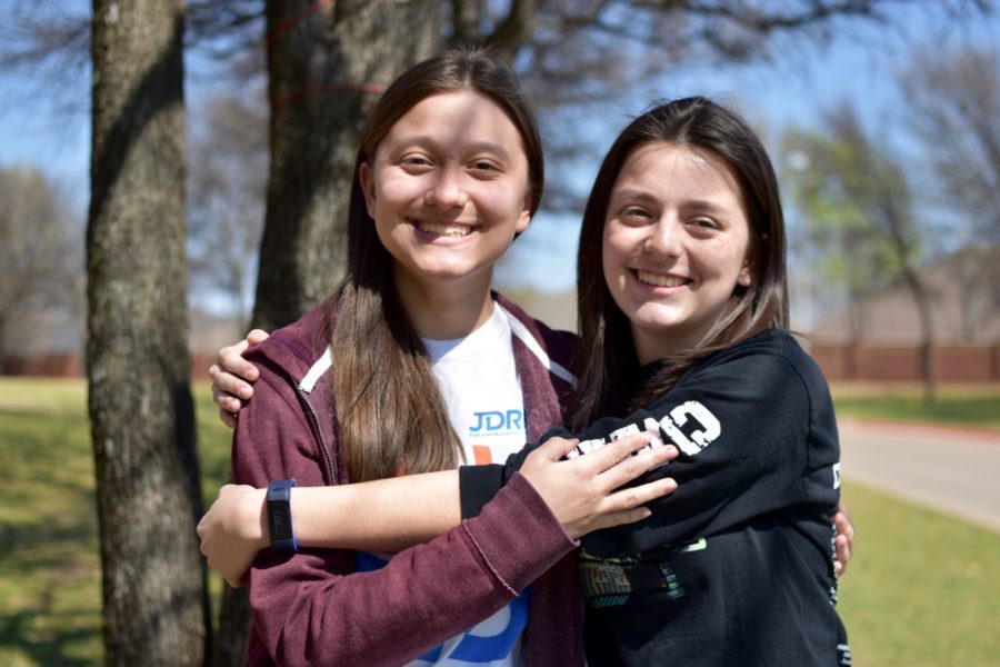 Coppell High School freshmen Abby Ramos ( left) and Alyssa Ramos (right ) are twins yet they have very different interests. The Ramos sisters enjoy different activities yet they still share a special bond. 
