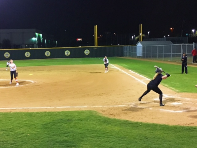 Coppell junior infielder Logan Kegley bats in the third inning.The Cowgirls (3-0) defeated W.T White Lady Longhorns (2-1), 17-0, in three innings due to the mercy rule on Friday night at the CISD Baseball-Softball Complex. 