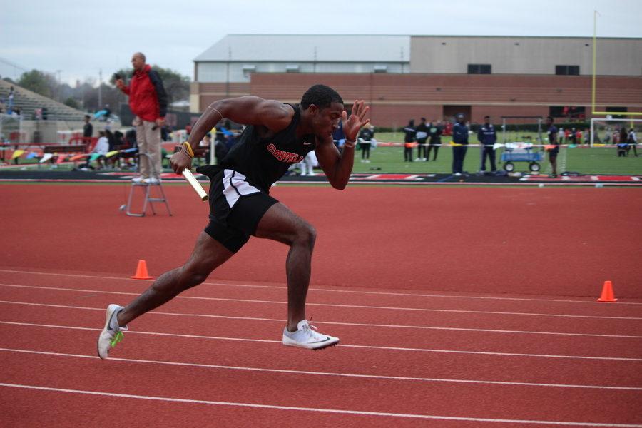 Coppell High School senior Cahlyl Rossin starts the boys 4x200m relay of the Coppell Relays at Buddy Echols Field on Saturday. The relay team, which finished eighth with a time of 1.32.91 was composed of Rossin, sophomore Jonathan McGill, senior Matthew Dorrity and senior Josh Freeman. 