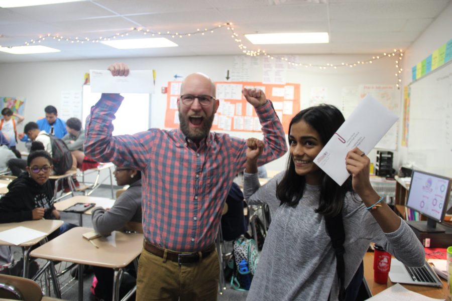 Coppell High School senior Amruta Deole surprises CHS IB Spanish teacher Creighton Hulse with an invitation to the Coppell Education Foundation Academic Recognition Banquet on Thursday. Seniors ranked in the top five percent were able to select one teacher who has impacted their learning to accompany them on April 25.