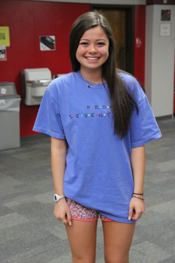 Coppell+High+School+senior+Savannah+Saucedo+wears+her+prom+shirt+on+Friday+to+show+her+school+spirit.+Groups+have+these+shirts+made+with+all+of+the+names+of+their+peers+in+the+prom+group+and+wear+them+the+day+before+the+CHS+prom.