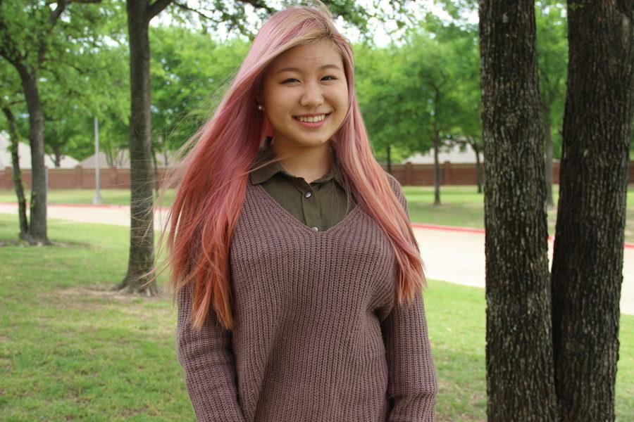 Coppell High School sophomore Rachel Choi embraces her pink hair, despite the many different reactions she has received because of it.
