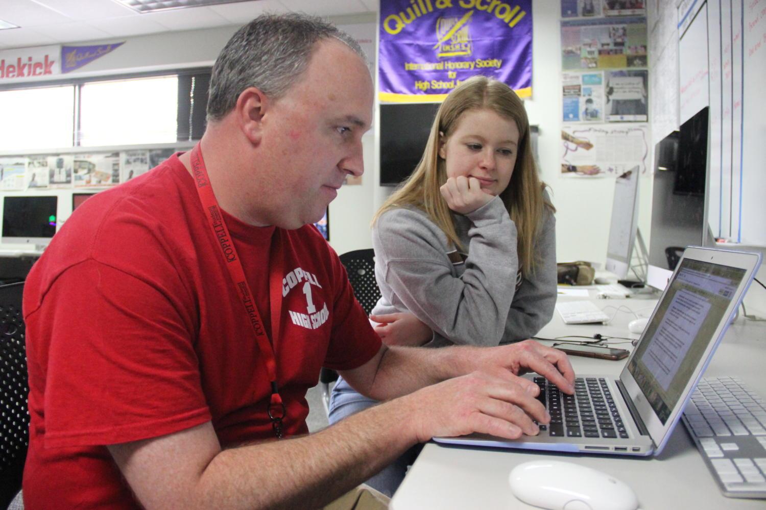 Coppell High School The Sidekick advisor Chase Wofford edits Editor-In-Chief Meara Isenberg’s story on May 10 during Wofford’s fourth period class. Wofford has been advisor for the award-winning newspaper staff for 12 years at CHS. Photo by Amanda Hair. 