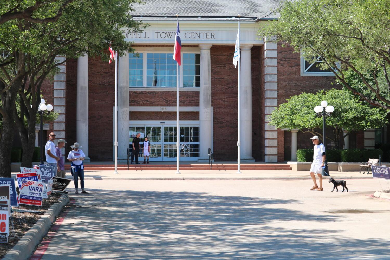Voters exit the polls at City Hall in the morning on Saturday, May 6 in Coppell. Positions for both the Coppell City Council and CISD Board of Trustees were made during this election.