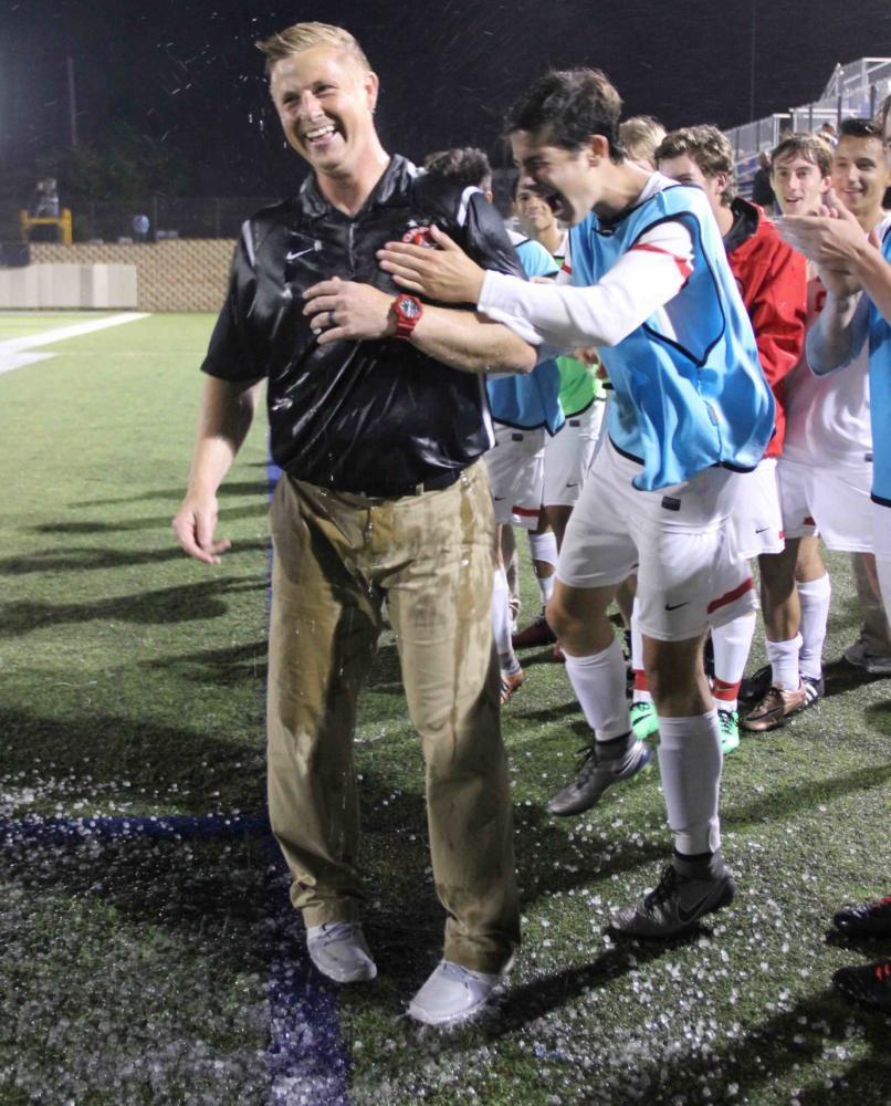 Coppell+soccer+coach+Chad+Rakestraw+is+embraced+by+junior+forward+Wyatt+Priest+after+the+UIL+Class+6A+state+championship+in+2016.+Rakestraw+will+leave+the+Coppell+program+to+coach+at+Flower+Mound+Marcus+in+the+2017-2018+school+year.+
