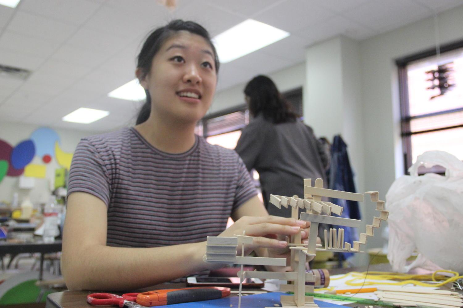 Coppell High School senior Eunice Choe works on a 3D sculpture during Cameron Tiede’s fourth period AP 3D Design class on May 12. AP 3D Design was one of the classes that was going to be cut for next year, but was added back after another art teacher’s contact was approved by the district. 